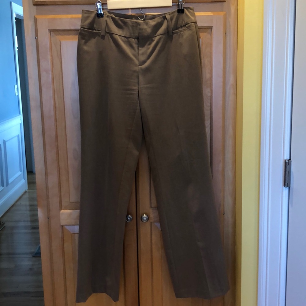 Beige dress pants.